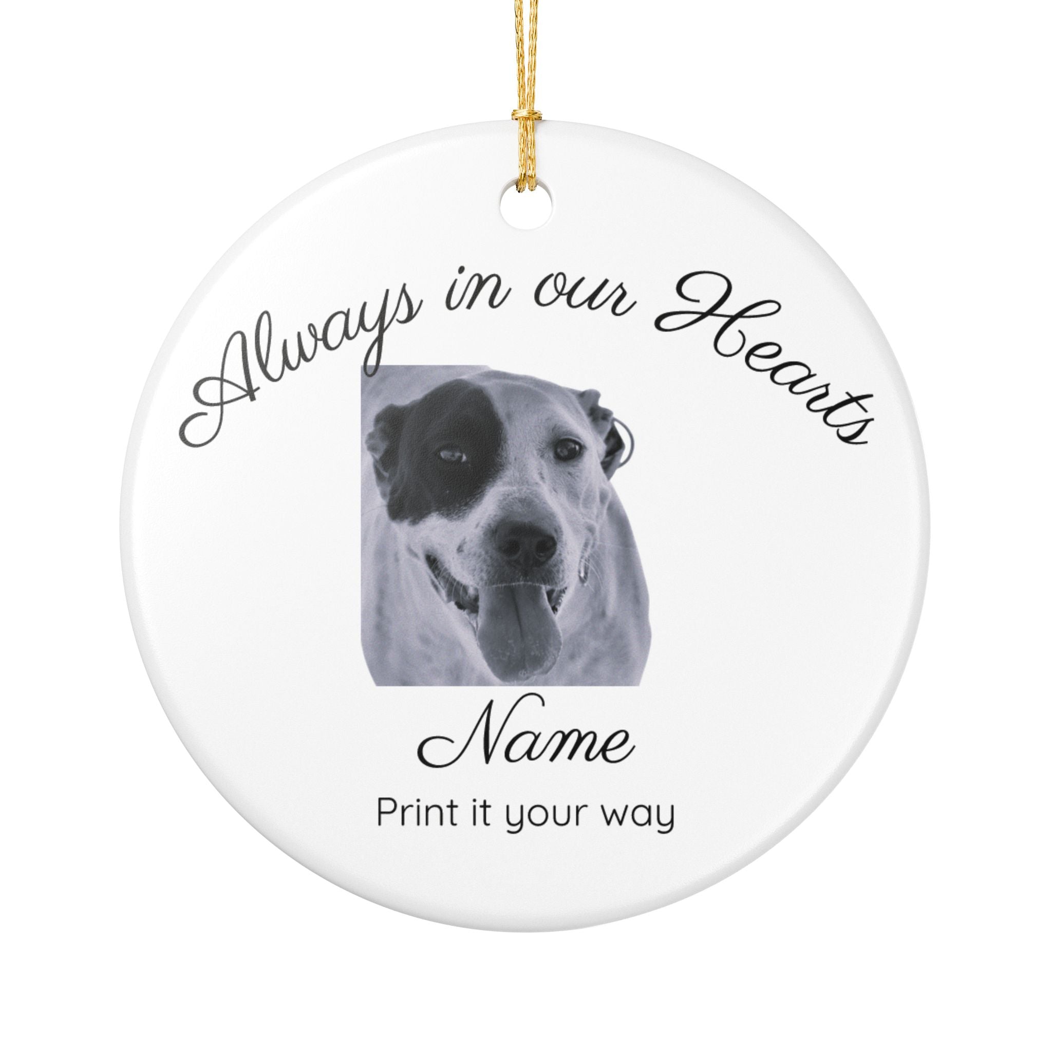Close-up of personalized pet memorial ornament showing photo print and name detail