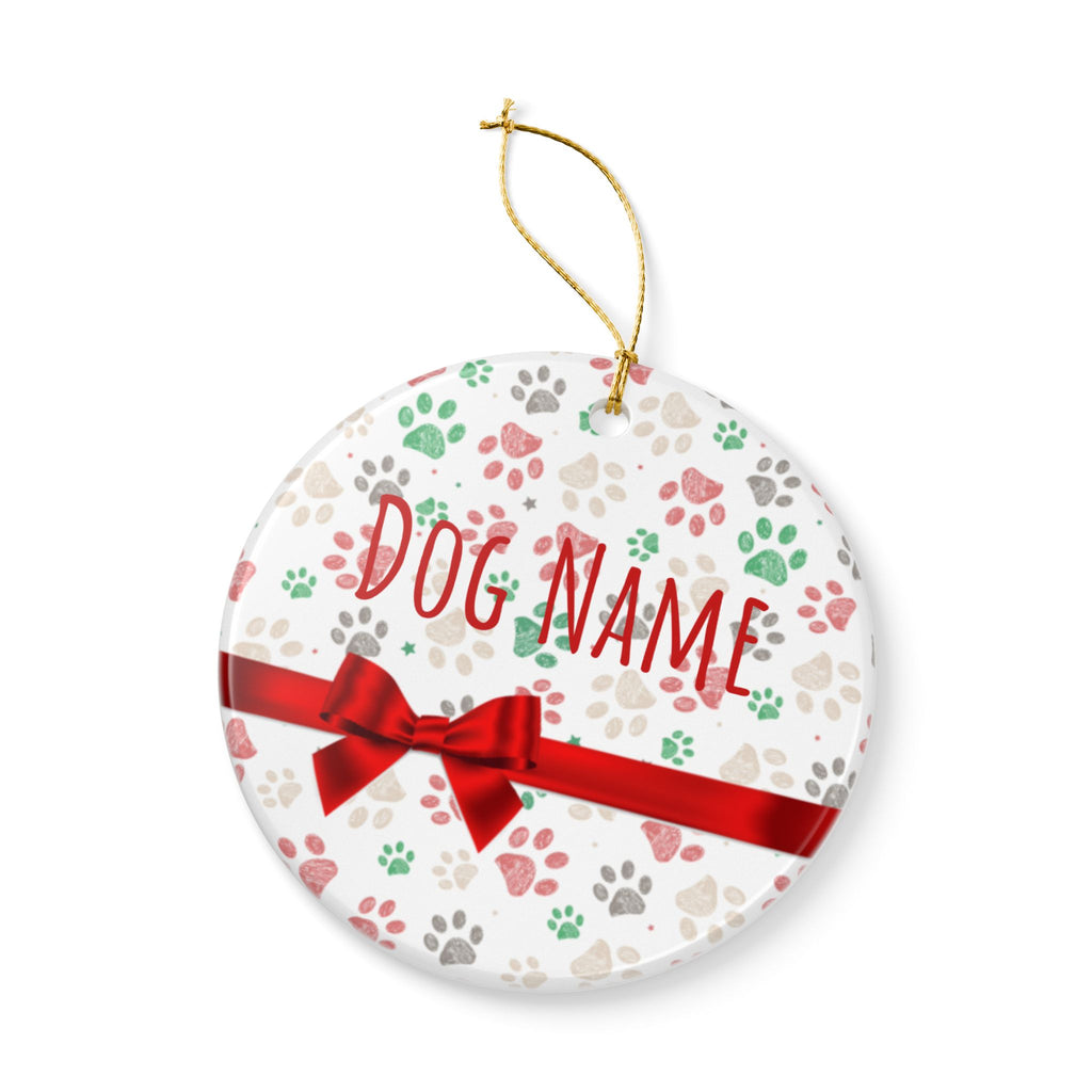 Paw print Christmas ornament flat lay on white background showing full design
