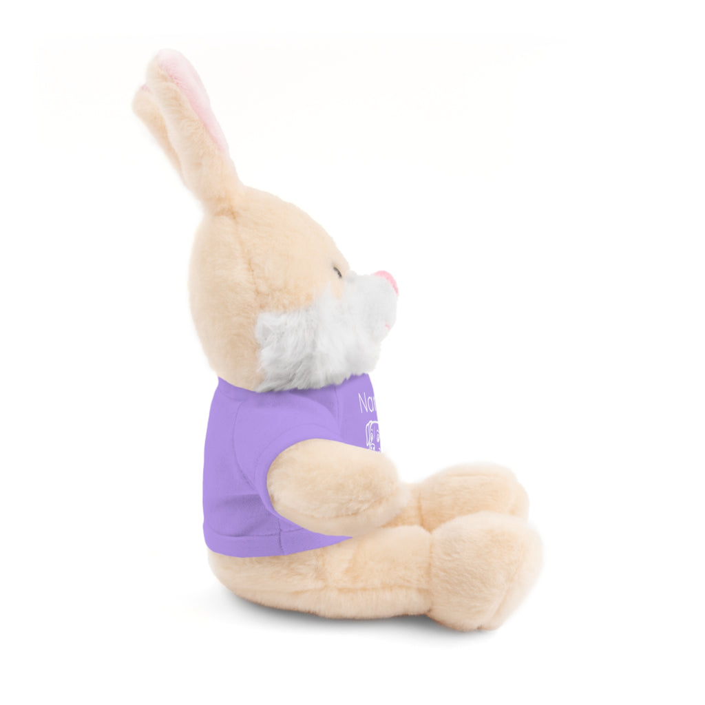Soft off white plush bunny wearing a Name is Brave personalized lavendar  tee shirt - side view