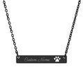 Personalized pet necklace flat lay on white surface showing black PVD coating