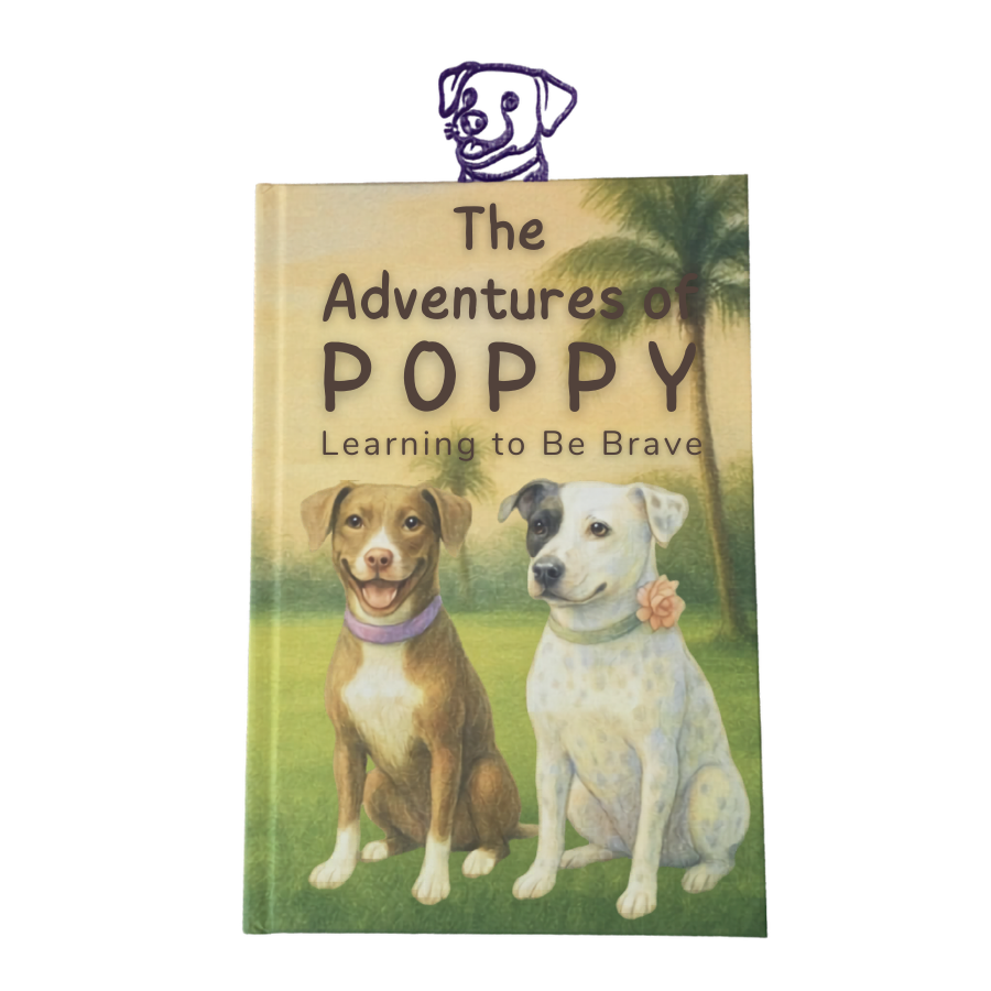 Book titled 'The Adventures of Poppy: Learning to Be Brave' with illustrations of two dogs on a cover.