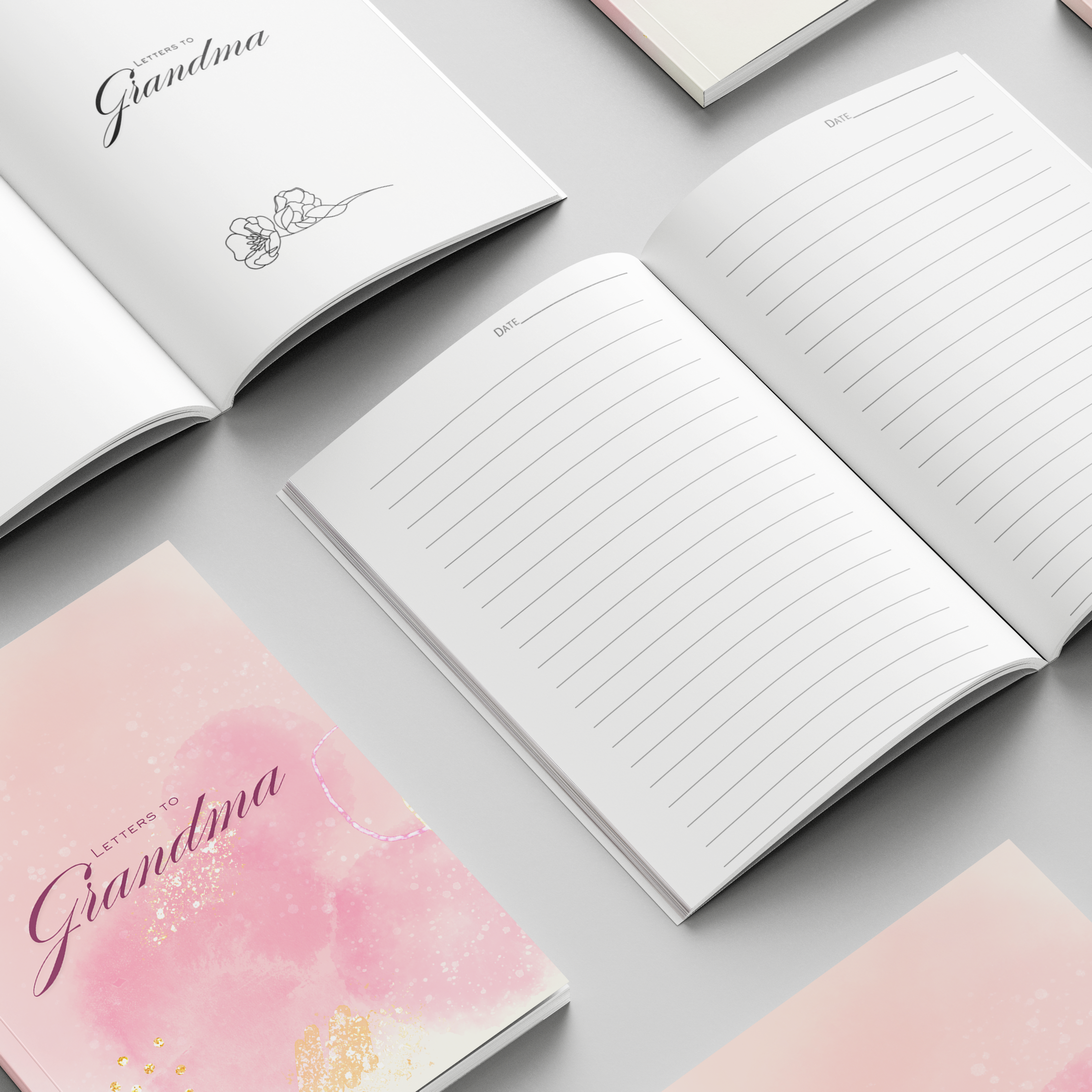 Notebooks with 'Grandma' on the cover, arranged on a light gray surface.